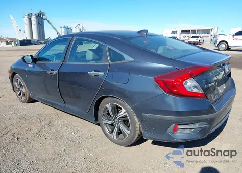 2017 Honda Civic Touring from USA, damaged, VIN 2HGFC1F9XHH642408